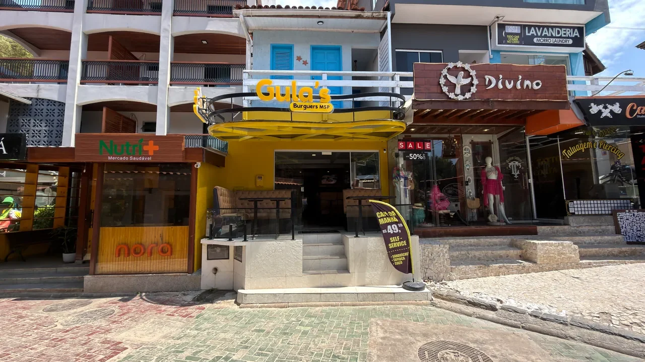 Fachada atual do Gula’s Burguers vista de frente, com letreiro amarelo